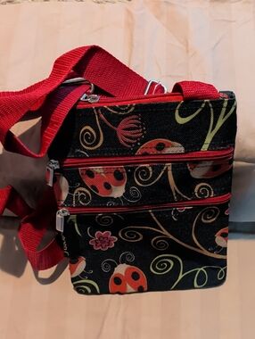 J Garden Crossbody Bag with Red Strap and Ladybug Print